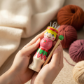 Wooden knitting spool with hands
